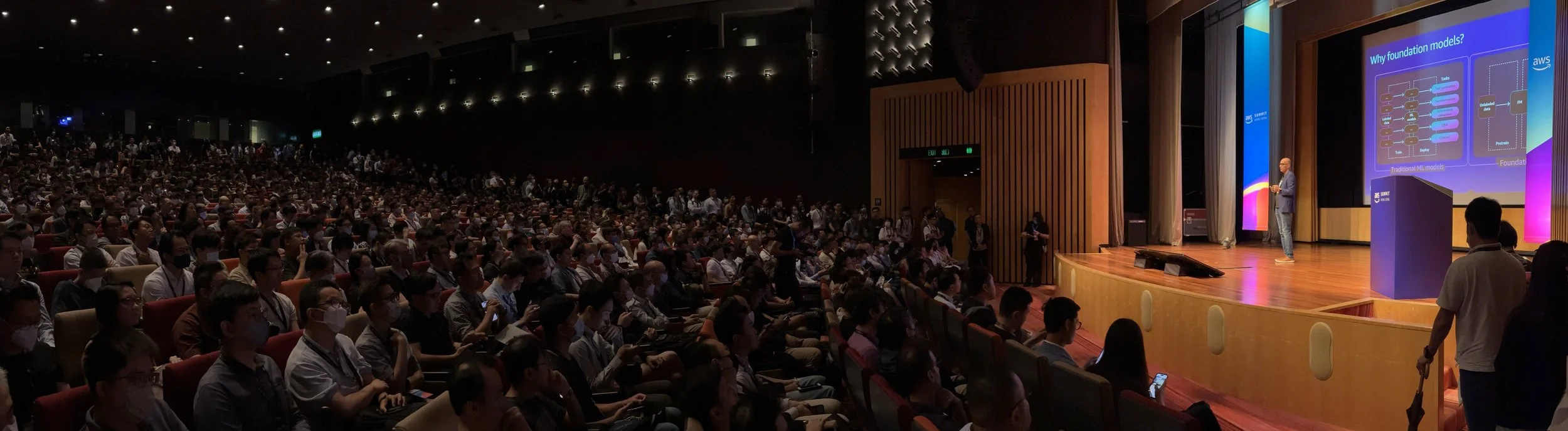 Ritesh delivering AI keynote to a large audience in Hong Kong